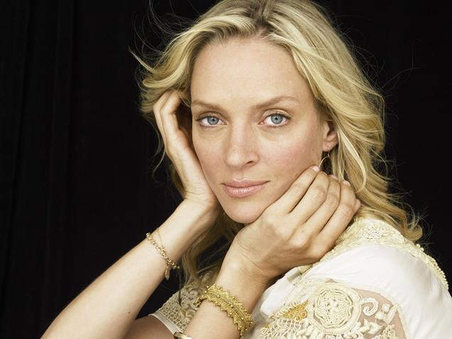 Uma Thurman signs for 911 Uma Thurman